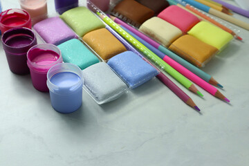 Materials for children creativity on light background                 