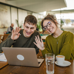couple have a video call meeting or video course on laptop at coffee