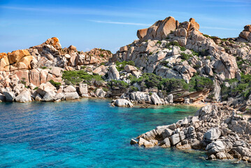view on rocky coast with the clear sea borded at Santa Teresa Gallura in Sardinia Italy