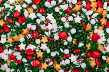 Christmas Sprinkles Background - Festive Holiday Baking Decorations with Red Stars, White Pearls, and Green Jimmies for Seasonal Confectionery and Desserts