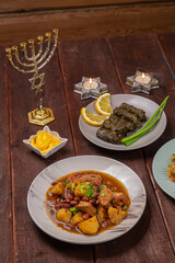 Menorah candles in candlesticks with the Star of David at the set table chelnt, bulgr