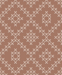 Vintage cross-stitch diamonds mocha mousse brown Pattern. Ethnic sewn Aztec geometrics in neutral monochrome brown seamless background.