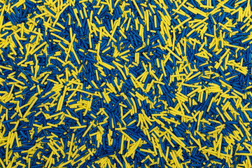 Vibrant Blue and Yellow Sprinkles Background - Team Colors Jimmies Texture for Sports Themed Confectionery Decorations, Baking Supplies, and Festive Dessert Toppings