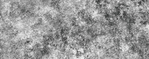A Naturally Distressed and Eroded Concrete Wall Creating an Abstract and Artistic Pattern

