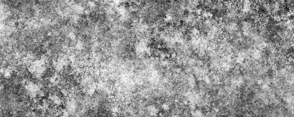 A Naturally Distressed and Eroded Concrete Wall Creating an Abstract and Artistic Pattern

