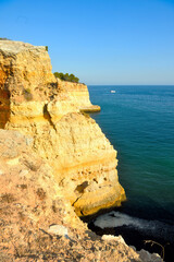 walking path with breathtaking views through the coast from porches to benagil caves lagoa algarve portugal
