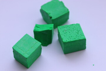 Soy wax paint in the form of cubes, green
paint, 