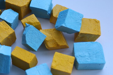 Paint for soy wax in the form of cubes, yellow 
paint, blue paint