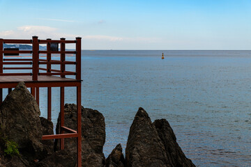 wooden observatory at the seaside on a cloudy day