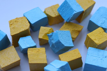 Paint for soy wax in the form of cubes, yellow 
paint, blue paint