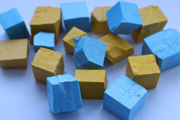 Paint for soy wax in the form of cubes, yellow 
paint, blue paint
