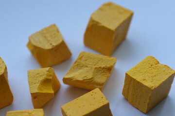 Paint for soy wax in the form of cubes, yellow 
paint