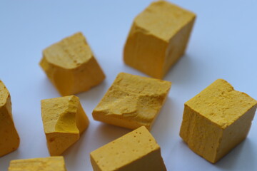 Paint for soy wax in the form of cubes, yellow 
paint