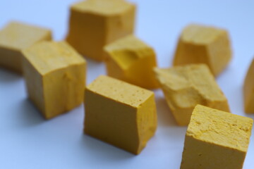Paint for soy wax in the form of cubes, yellow 
paint
