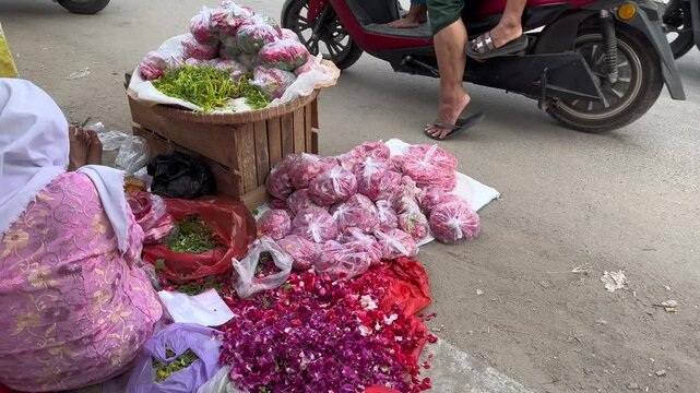 Seller of flowers for grave pilgrimages
