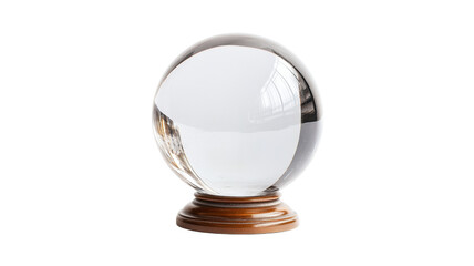 Crystal ball on wooden stand reflecting light on transparent background