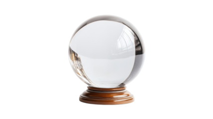 Crystal ball on wooden stand reflecting light on transparent background