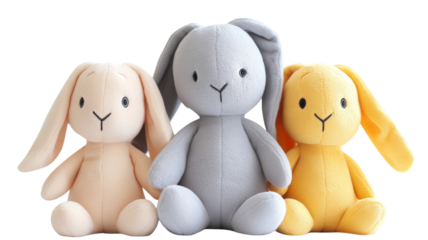 Three plush rabbits sitting on transparent background