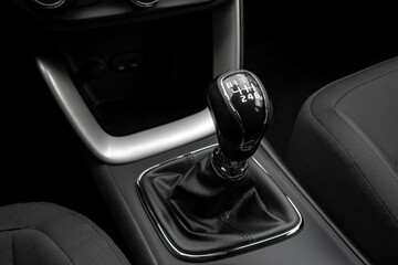 Car gear shift knob. Transportation background