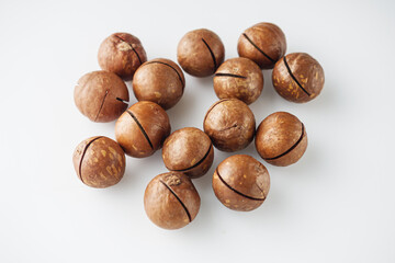 macadamia nuts on white background