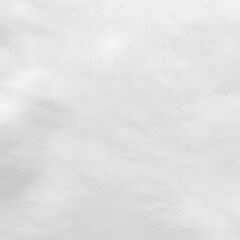 White textured fabric surface with diagonal pattern for design background