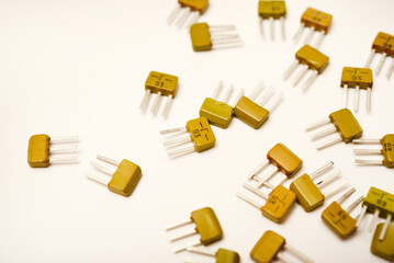Old transistors on a white background. Electronic elements.