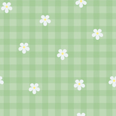 seamless pattern of chamomile on a green checkered background