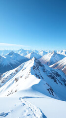 snow covered mountains stretch far beneath brilliant clear blue sky winter day perfectly serene