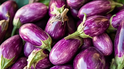 Purple eggplants with their vibrant color and organic shapes show off their rich texture and natural beauty. They're perfect for cooking and farming.