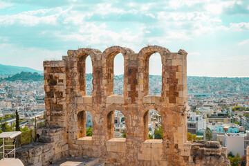 The Roman theater of Odeon of Herodes Atticus in the foreground and the Filopappou Hill in the...