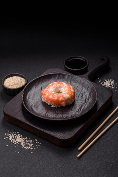 Naklejki Donut shaped sushi rolls with salmon, shrimp and tuna