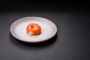 Donut shaped sushi rolls with salmon, shrimp and tuna