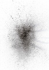 A bold abstract artwork capturing a chaotic explosion of black ink splatters on a white background, evoking movement and depth.