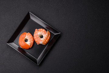 Donut shaped sushi rolls with salmon, shrimp and tuna
