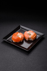 Donut shaped sushi rolls with salmon, shrimp and tuna