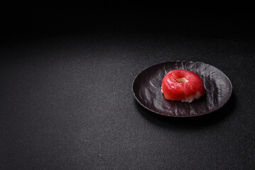 Donut shaped sushi rolls with salmon, shrimp and tuna