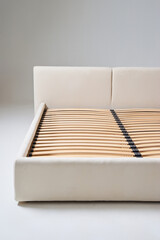 Modern Upholstered Bed Frame with Wooden Slat Support System..