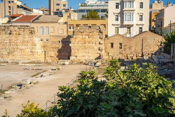 The most famous architectural landmarks of ancient greek heritage located in the Plaka district in...