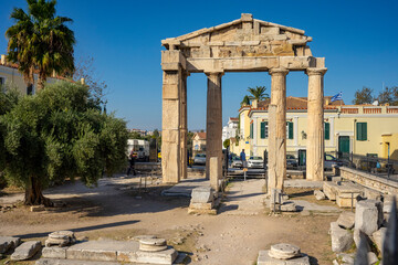 Fototapeta premium The most famous architectural landmarks of ancient greek heritage located in the Plaka district in Athens, Greece: the library of Hadrian, Wind tower, medieval mosque