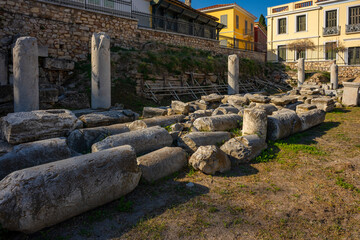 The most famous architectural landmarks of ancient greek heritage located in the Plaka district in Athens, Greece: the library of Hadrian, Wind tower, medieval mosque