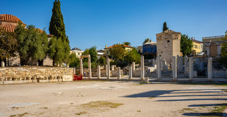 The most famous architectural landmarks of ancient greek heritage located in the Plaka district in...
