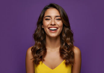 Fototapeta premium Young spanish woman happy on purple background