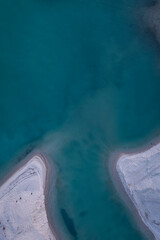 Aerial view of a exotic sandy peninsula of Posidi with turquoise clear sea. Kassandra, Chalkidiki, Greece
