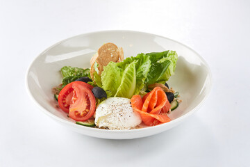 salad with feta in the white plate
