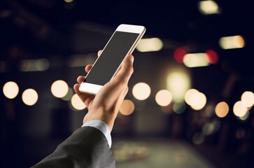 Hand typing on phone for social media