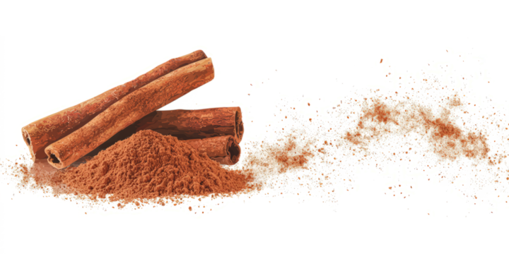 Rich brown cinnamon powder in a neat pile with a light dusting around it, on a white background