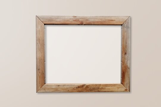 Blank wooden mirror or foto frame on wall