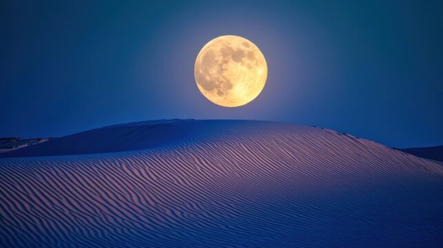 Photo de lune sur les dunes de sable