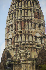 Outdoor Ancient standing stucco Garuda at Main Pagoda ( Prang ) in Wat Ratchaburana ruins is considered a very important temple is Unesco World Heritage Site in Ayutthaya Historical Park in Thailand.