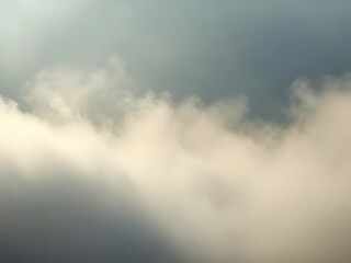 Obraz premium Abstract Cloudscape Soft Beige and Gray Clouds in a Blue Sky - Atmospheric Nature Photography.